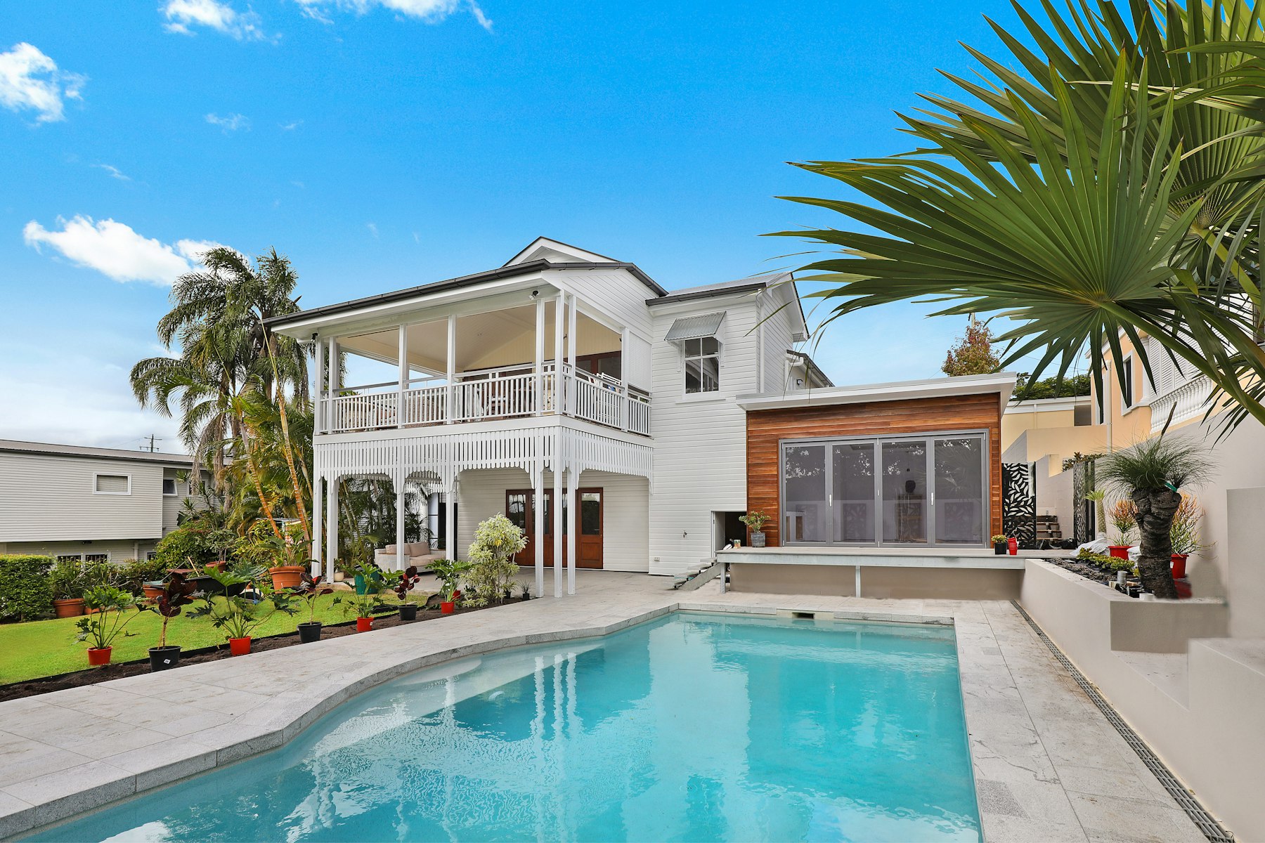 A modern Arizona home with a clean, professionally built backyard pool